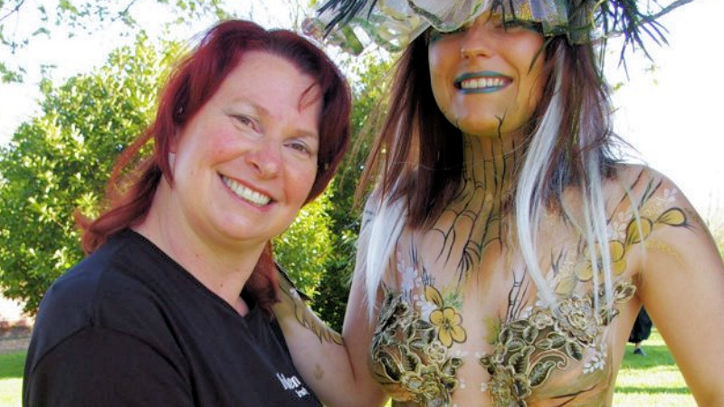 Themed corporate body and face painting for themed product launch